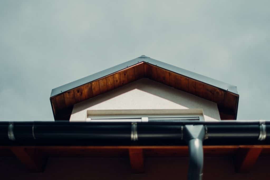 5 Ways That The Weather Can Impact Your Roof - bottom view of red roof