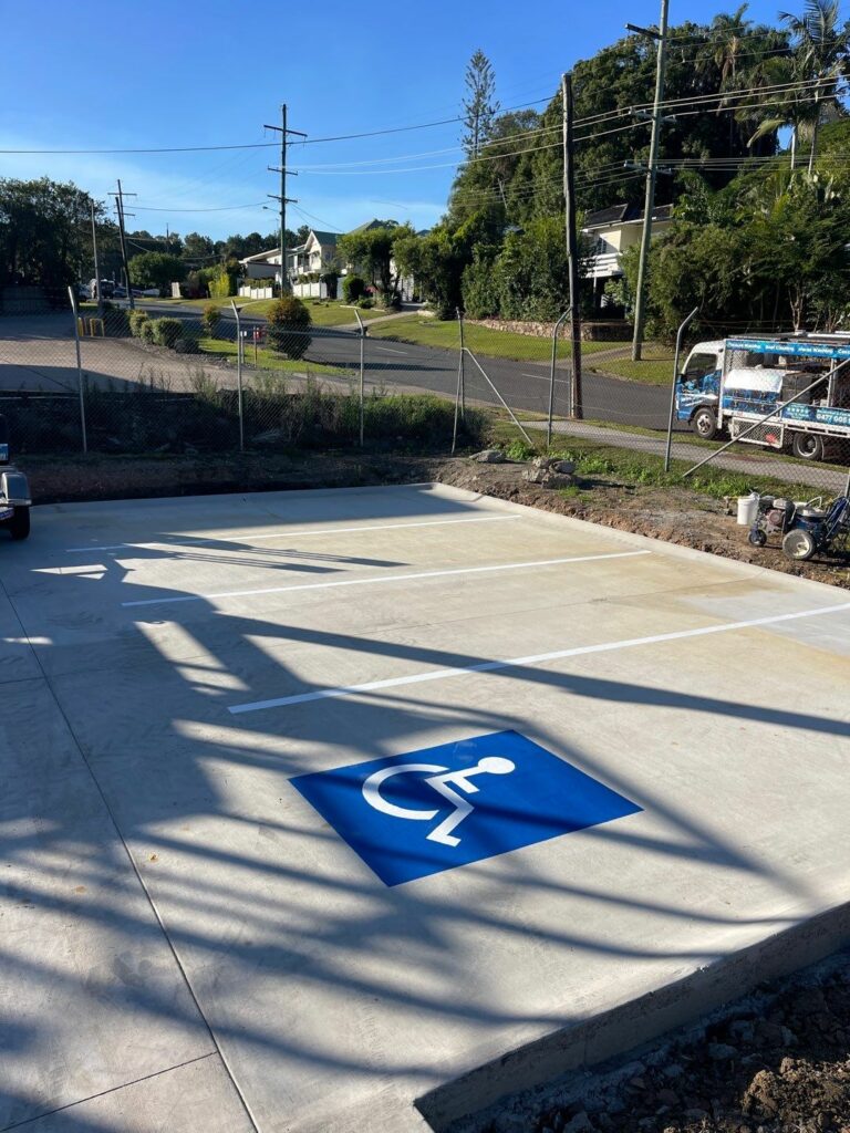 closeup of disabled parking lot striping