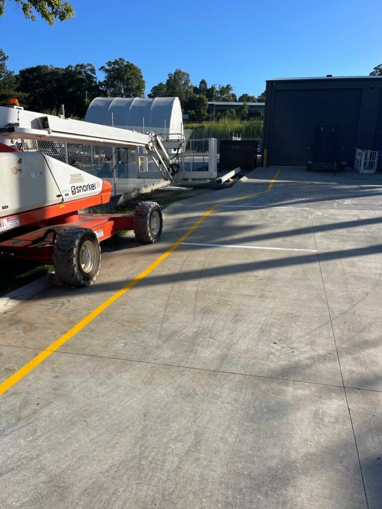yellow line across carpark