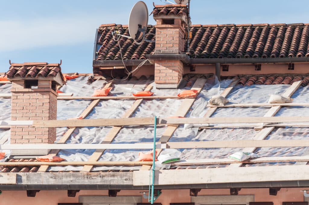 op Signs Your Home Has A Drainage Problem - damaged roof missing shingles