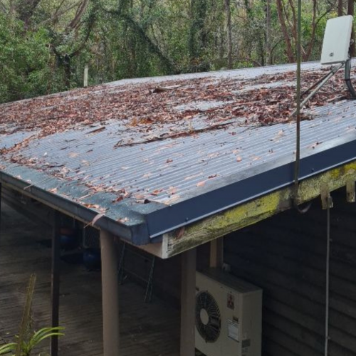roof repairs - closeup of dirty roof