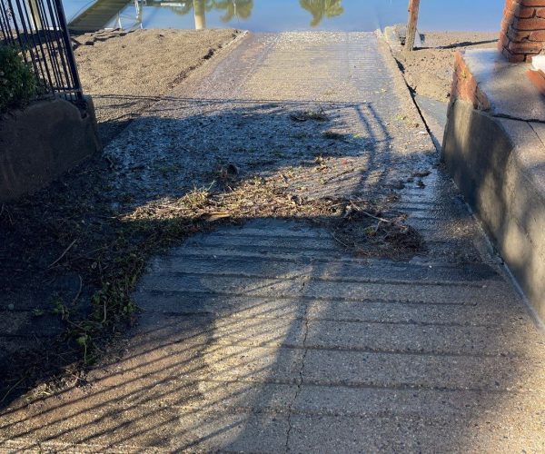 Boat Ramp cleaning - view of boat ramp with debris and dirt