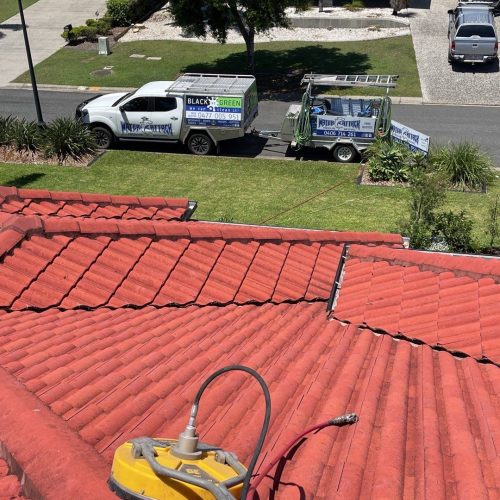 Signs Of A Roof Leak - soft washing on red tiles