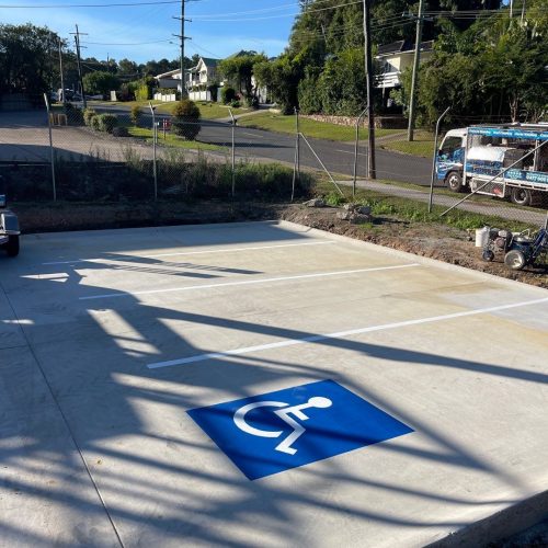 closeup of disabled parking lot striping