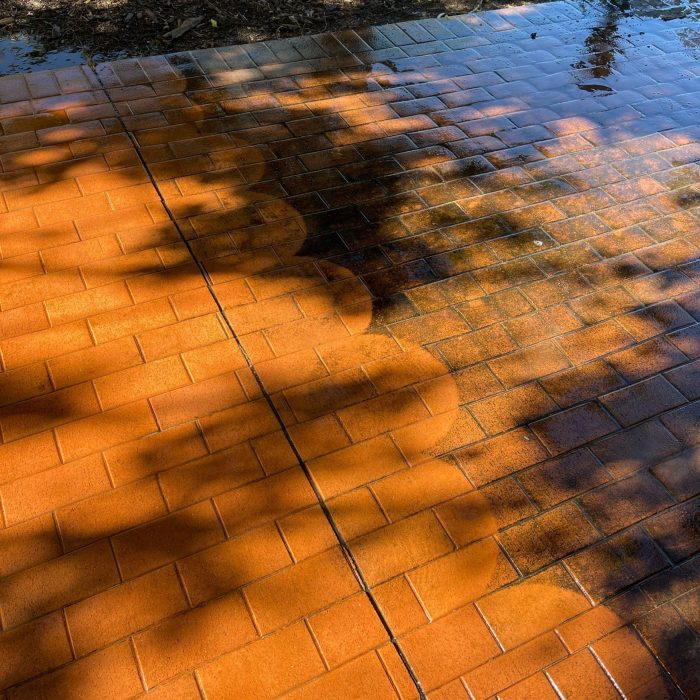 Pressure Cleaning Brisbane - before and after pressure washing brick floor