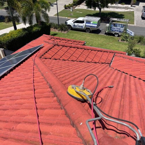 roof cleaning Brisbane - soft washing red terracotta roof