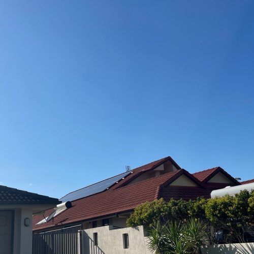 roof soft wash - house and blue sky