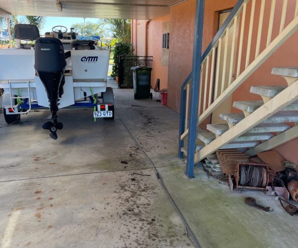 Boat Ramp cleaning - dirt boat shed floor