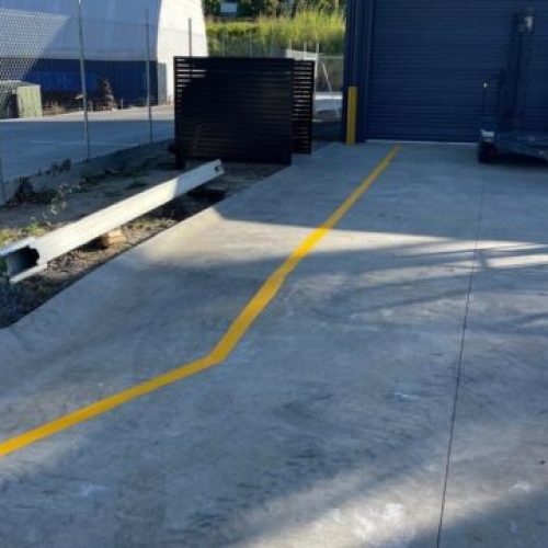 yellow and white parking lot lines