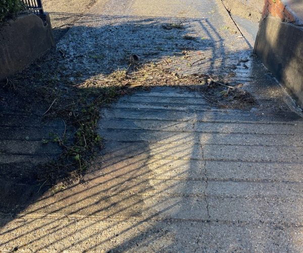 Boat Ramp cleaning - closeup of comparison of pressure washed concrete ramp surface